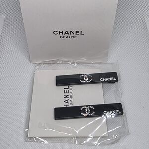 CHANEL Black Hair Clips with Crystal Logo